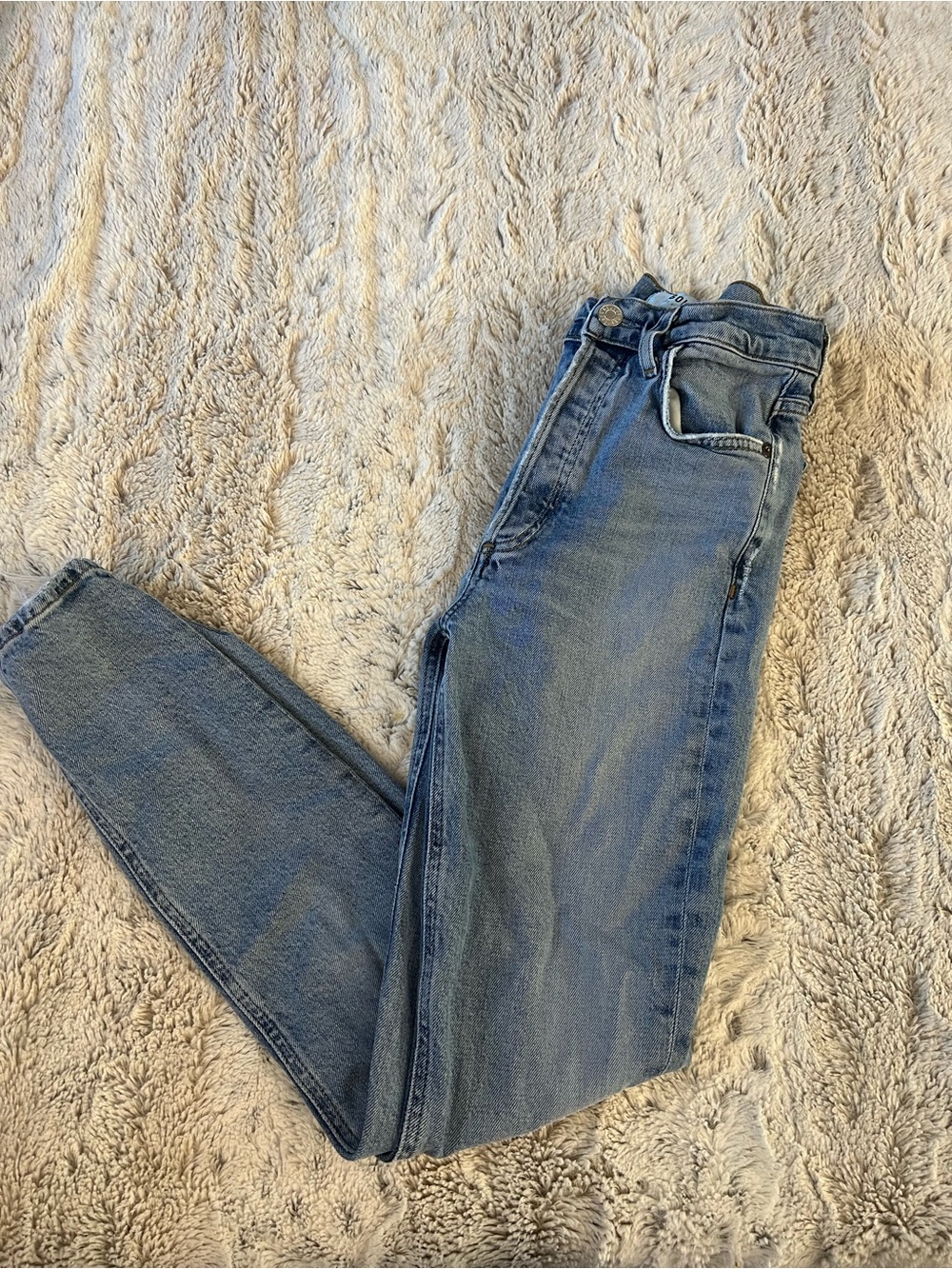 Light blue jeans by Agolde